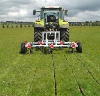 Yeomans plow working fitted fixed shanks and crumble roller also tickle pot seeders, coulters on john deere tractor