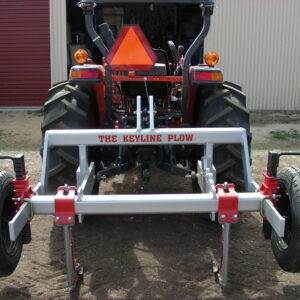 Yeomans plow on kubota tractor fitted with ripple bar height wheels and 2 shanks