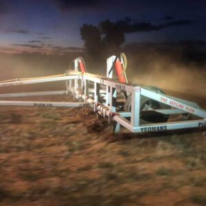 Yeomans plow at night operating, fixed shanks and hydraulic wheels