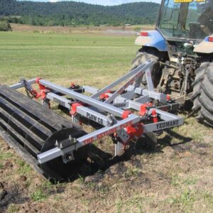 Yeomans GP39 working in green field, green ripping for keyline water control, sub soil aeration, fitted with crumble roller, 5 22in shanks 5 16 coulters xarm roller