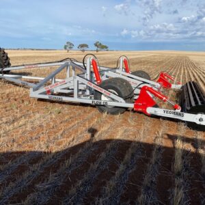 Yeomans trialing plow with hydraulic depth control and crumble roller