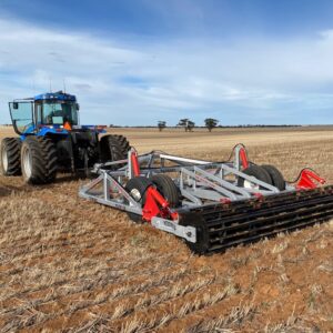 Yeomans trailing plow with hydraulic depth control and crumble roller