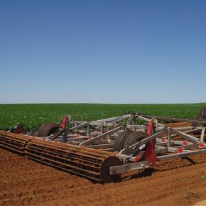 Yeomans large plow fitted with hydraulic crumble roller and hydraulic depth control wheels