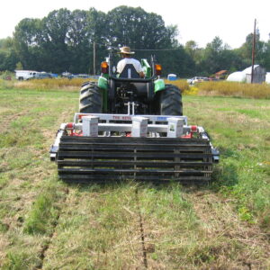 Yeomans keyline plow fitted with tickle pot feeders and crumble roller - on a john deere tractor - subsoil regeneration